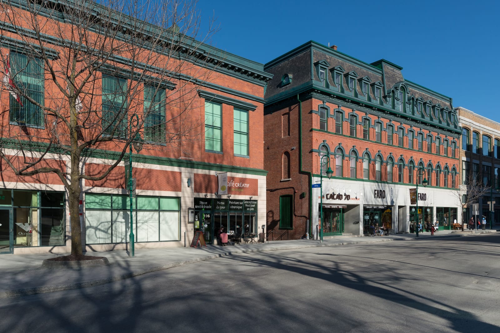 The brick storefronts of Wellington Street in downtown Sherbrooke at the end of the day